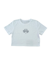 NH X HG STAR SIGN CROP TOP SHIRT