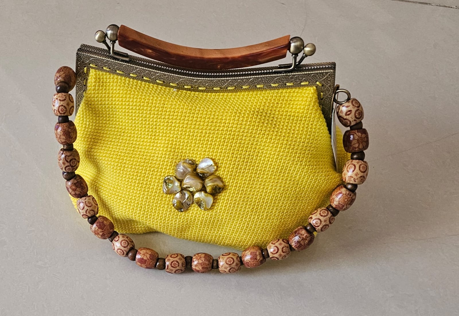 Yellow crochet handbag