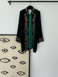 Syriana green jacket with gold embroidery and red flowers